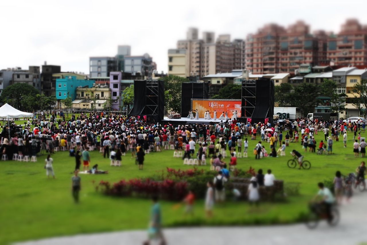 Tilt-shift image of crowd enjoying music concert