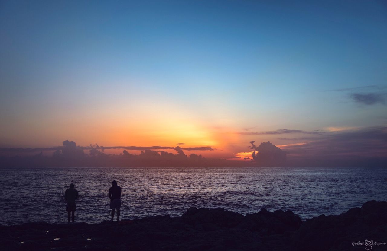 SILHOUETTE BEACH AGAINST SKY DURING SUNSET