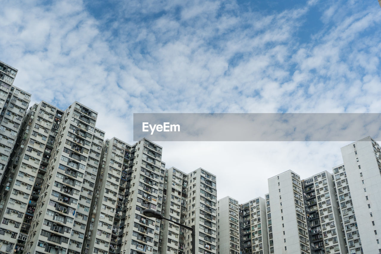 Low angle view of modern buildings against sky