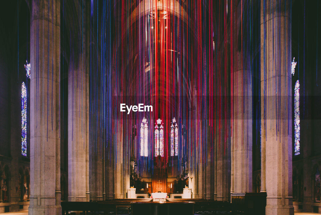 LOW ANGLE VIEW OF ILLUMINATED BUILDING