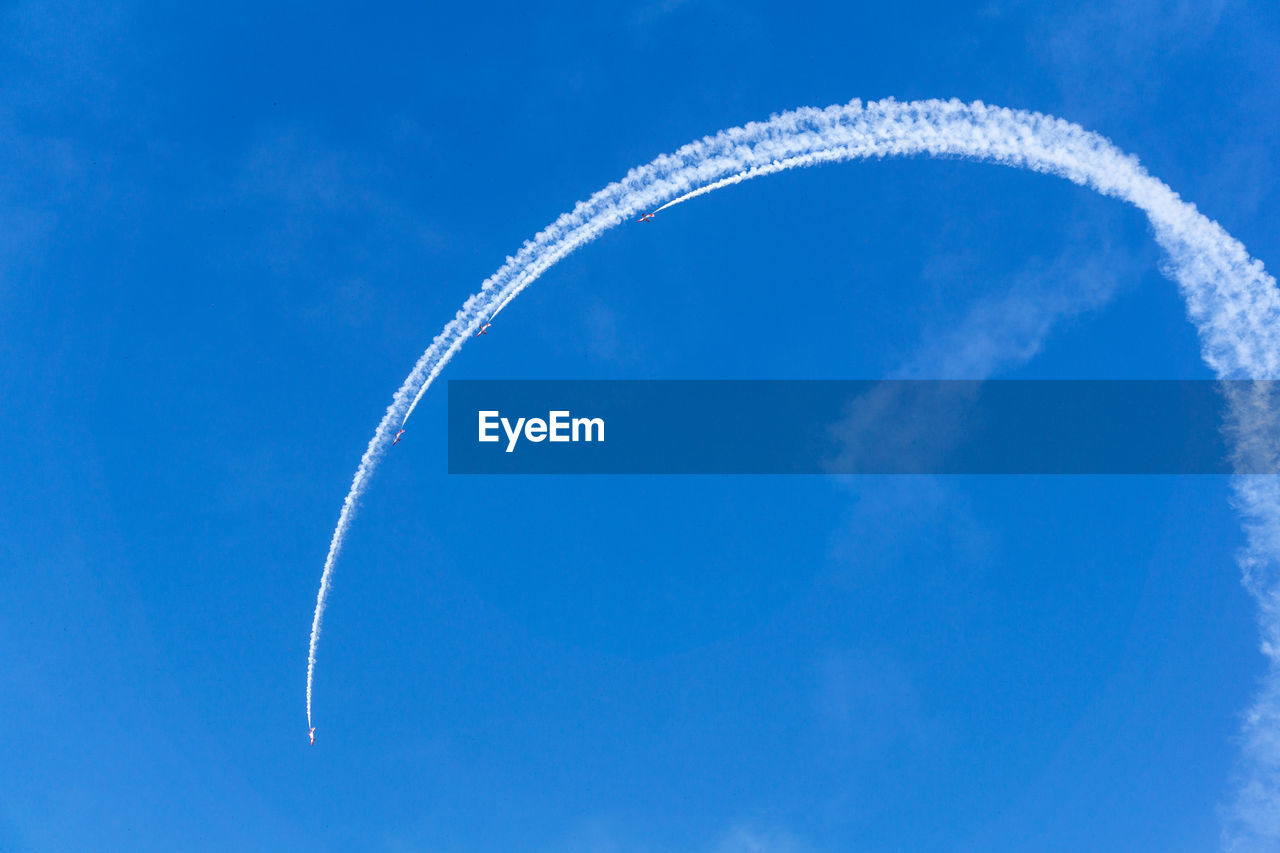 LOW ANGLE VIEW OF AIRPLANE AGAINST SKY