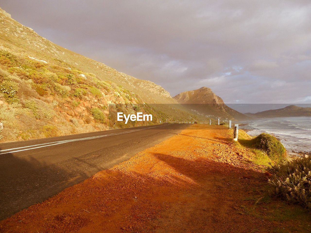 ROAD PASSING THROUGH MOUNTAINS