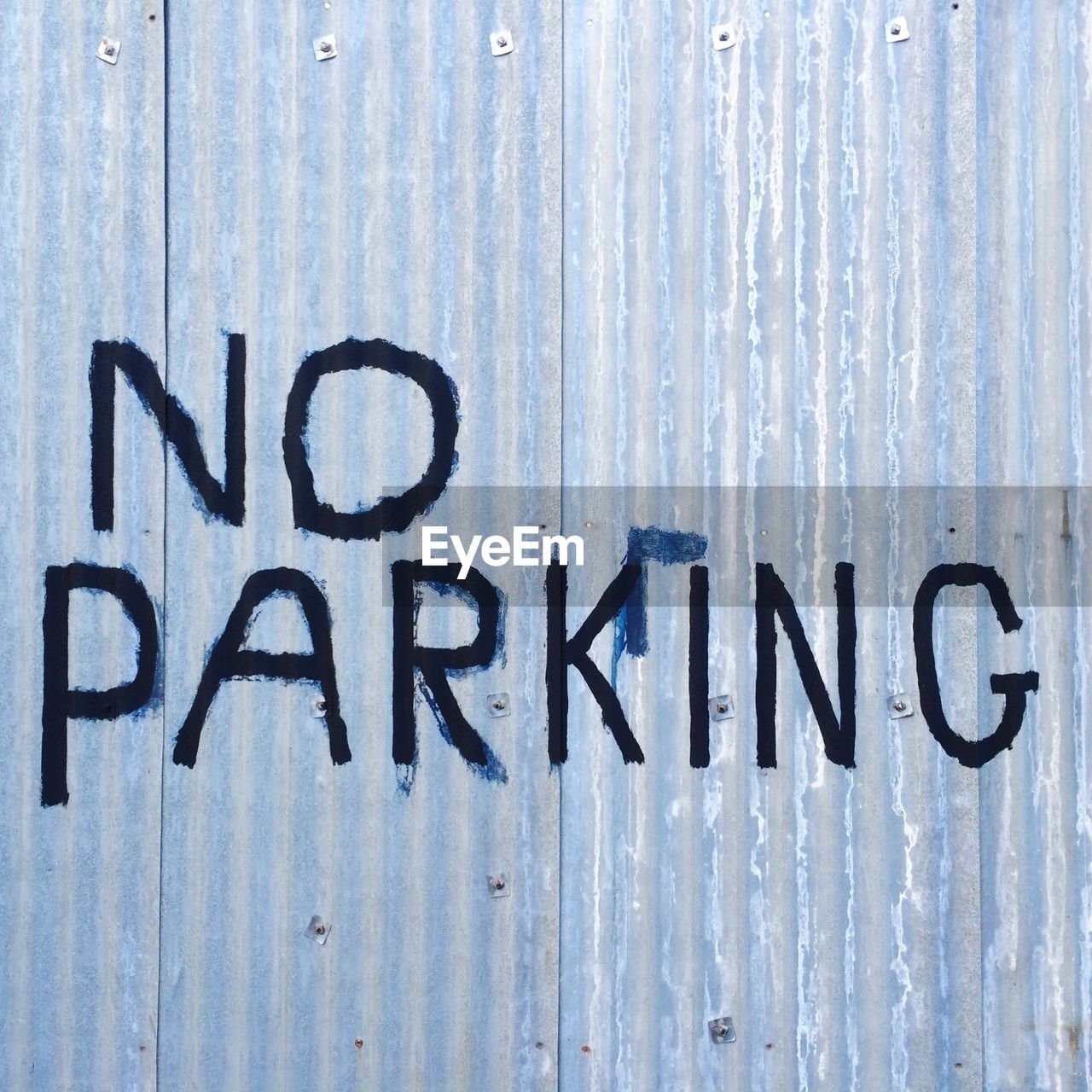 No parking sign on metal