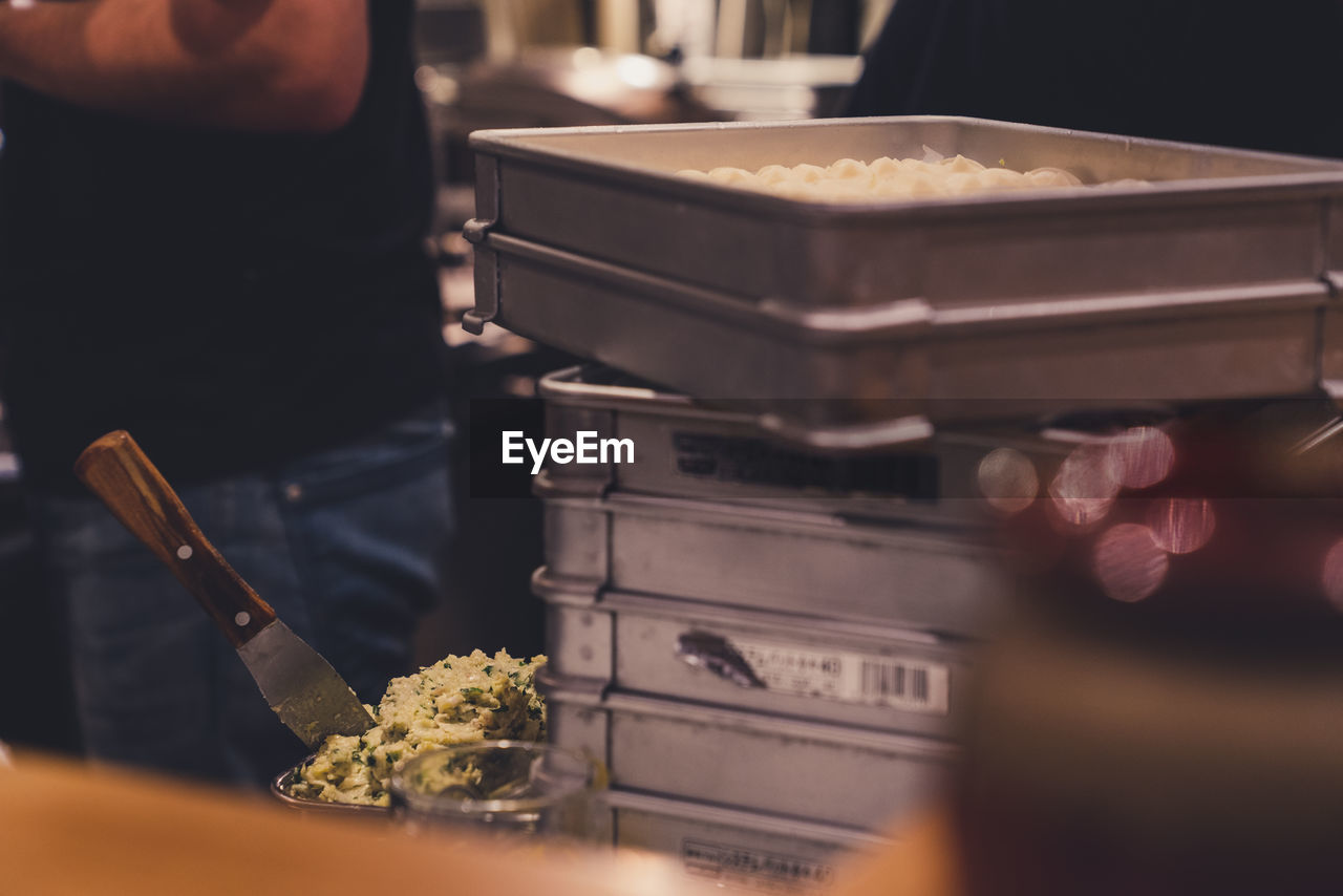 Close-up of food in container at restaurant kitchen