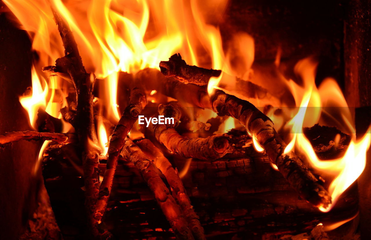Flames and fire in a wood burning stove
