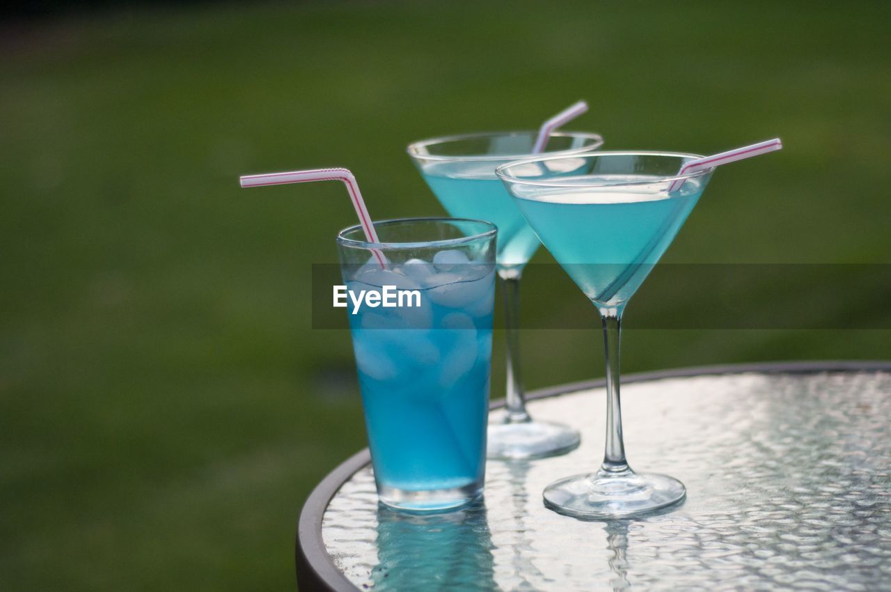 Close-up of drink in glasses on table