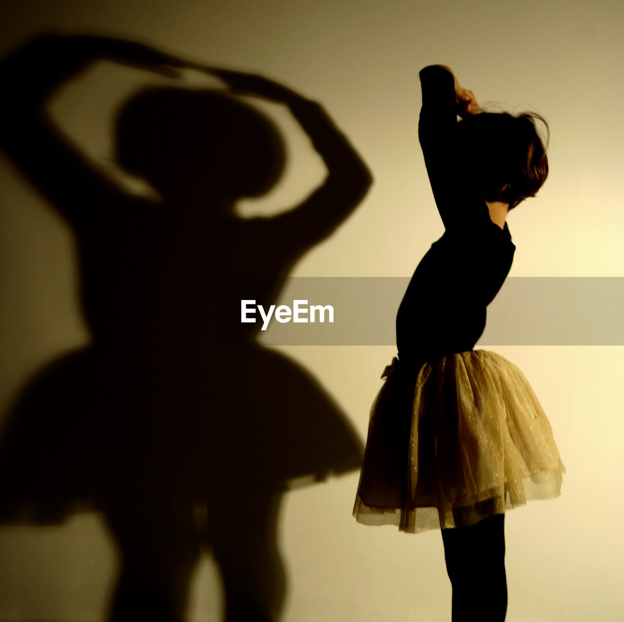 Girl standing against white background