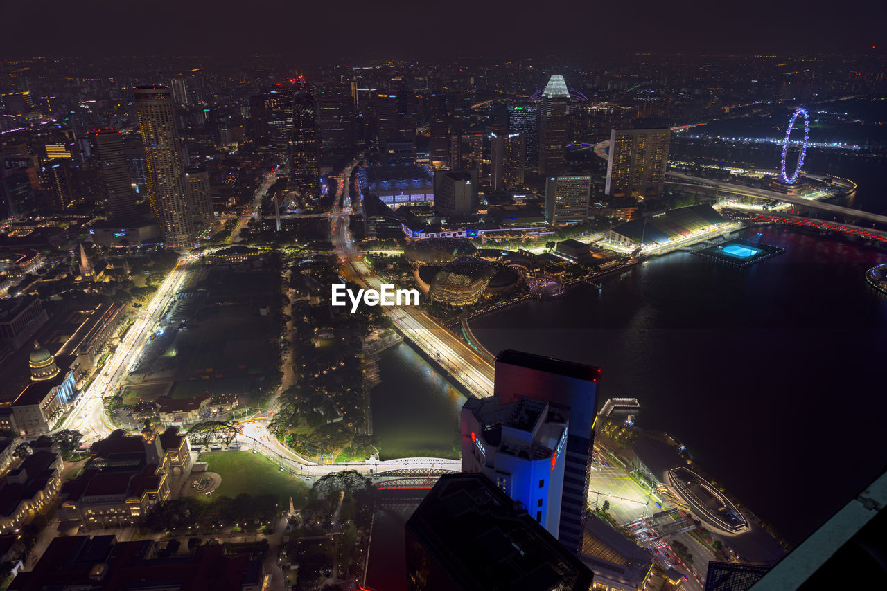 High angle view of illuminated buildings at night