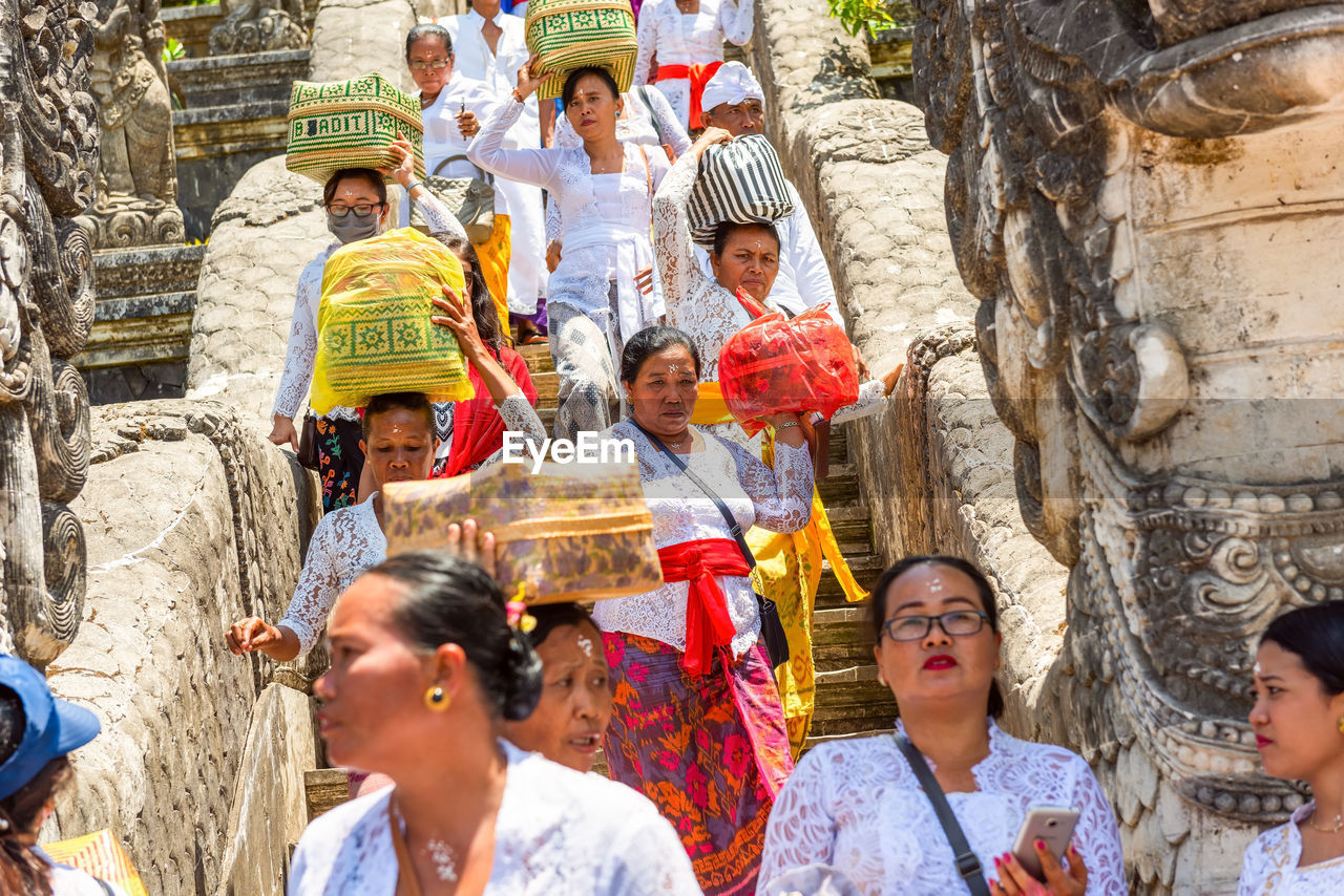 GROUP OF PEOPLE IN TRADITIONAL CLOTHING