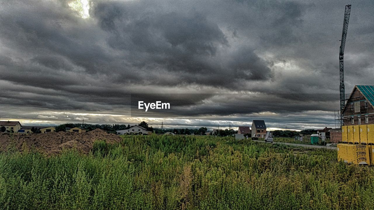 SCENIC VIEW OF LANDSCAPE AGAINST CLOUDY SKY