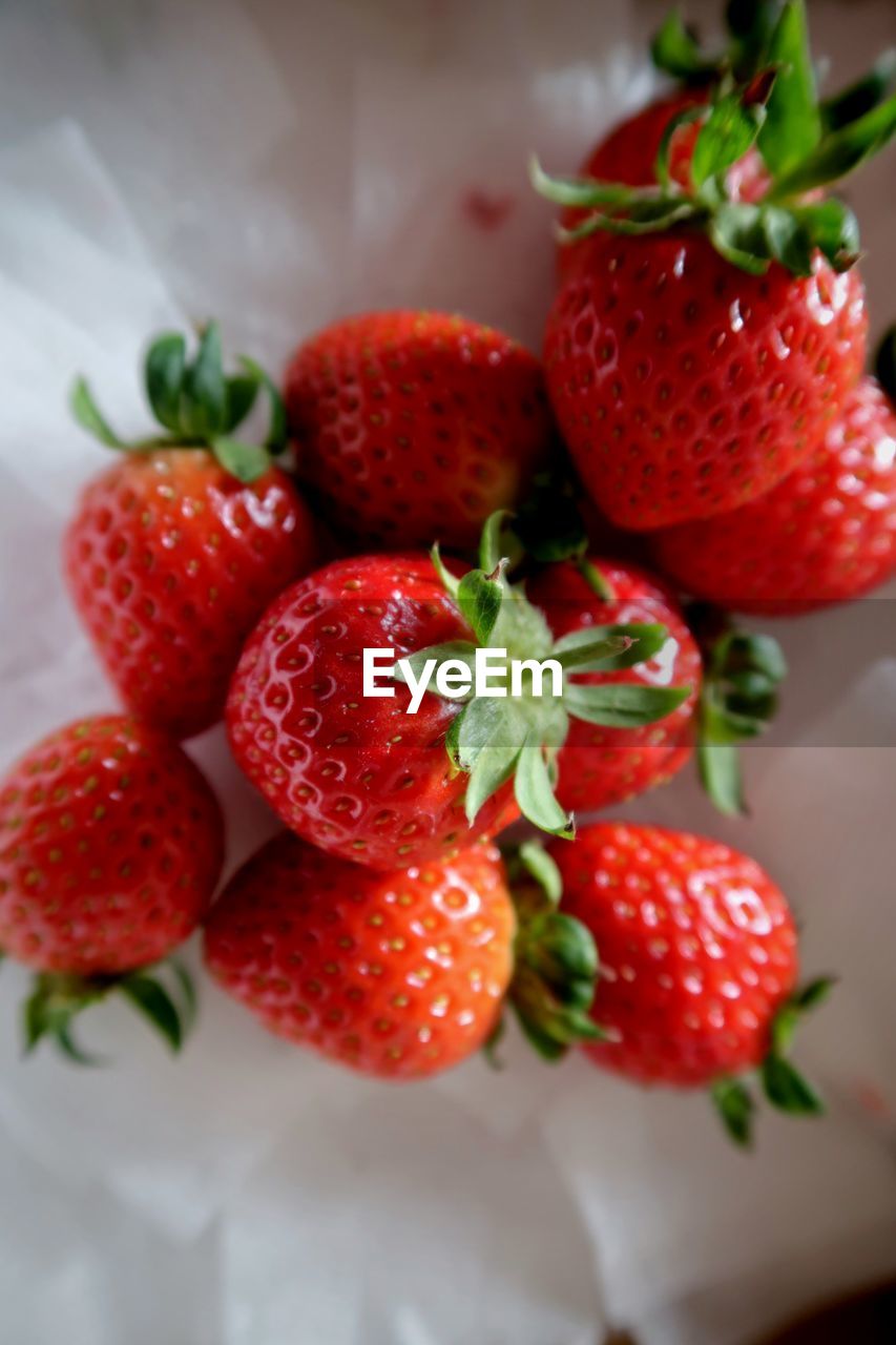 High angle view of strawberries on table