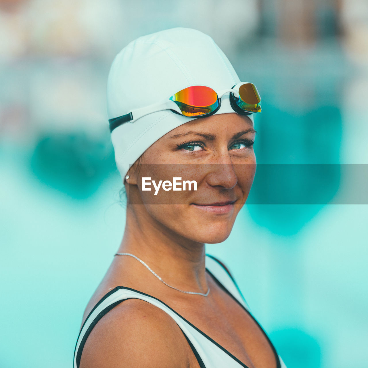 Portrait of woman wearing swimming goggles