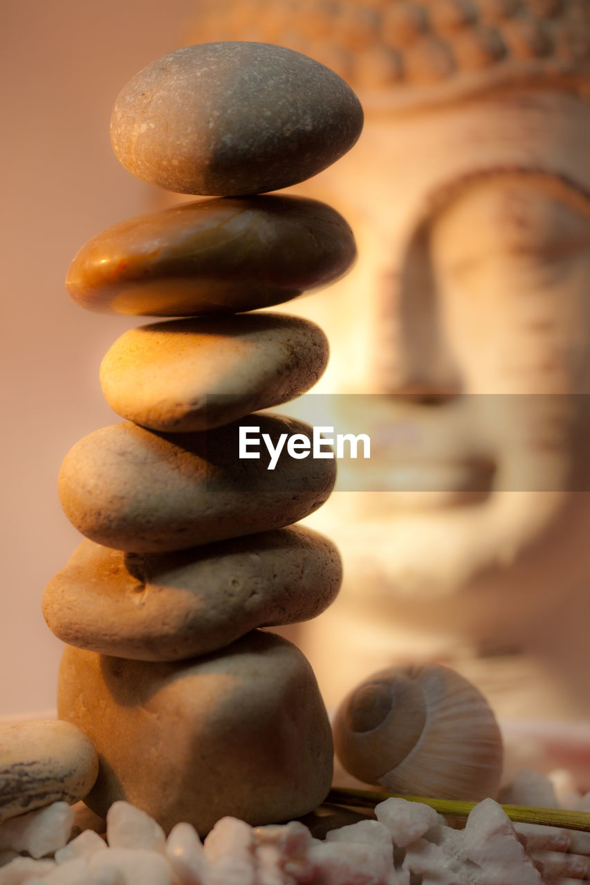 CLOSE-UP OF STONE STACK ON PEBBLES