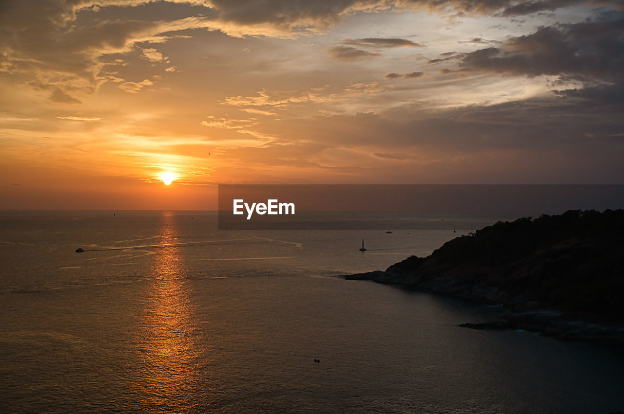 SCENIC VIEW OF SEA DURING SUNSET