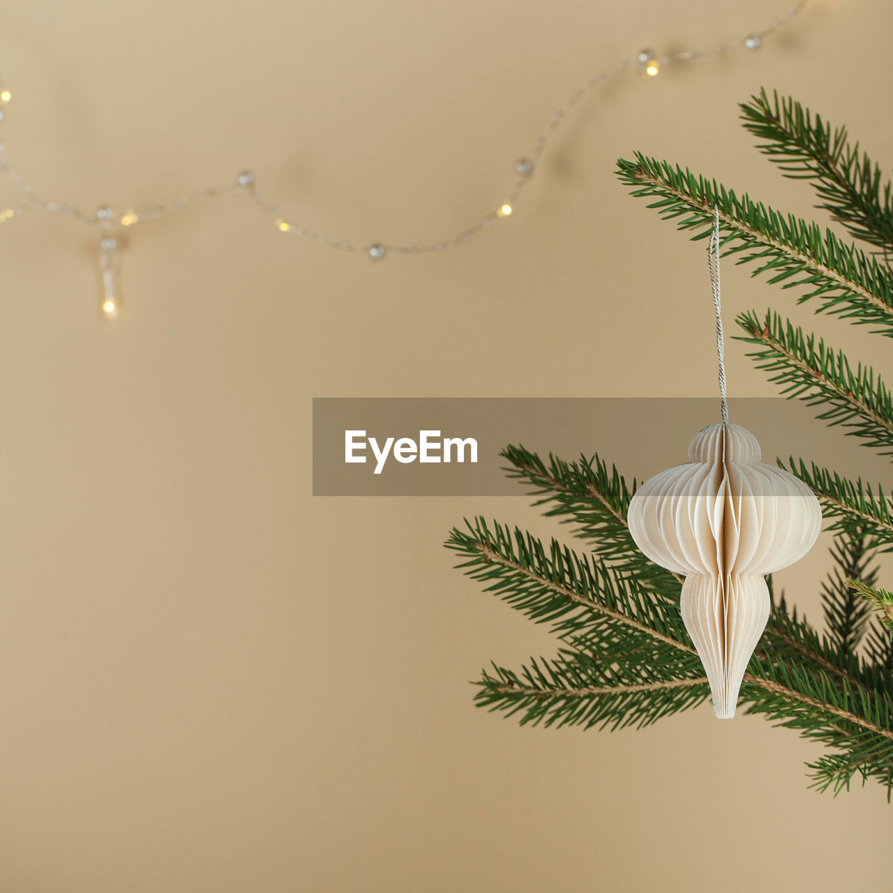 Christmas background with elegant christmas tree toy, garland. retro-style. minimalism. 