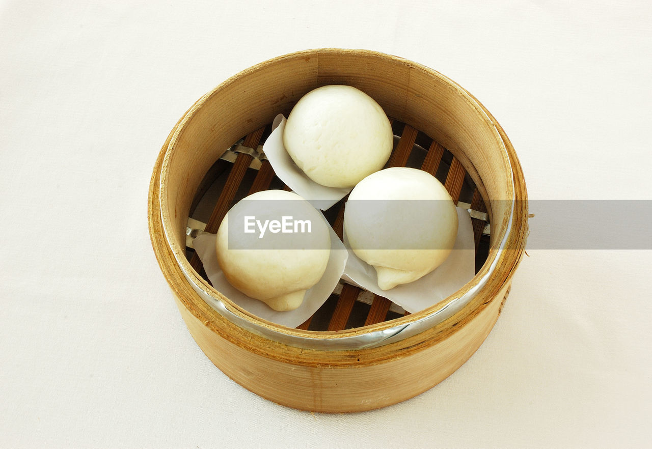 CLOSE-UP OF EGGS IN BASKET