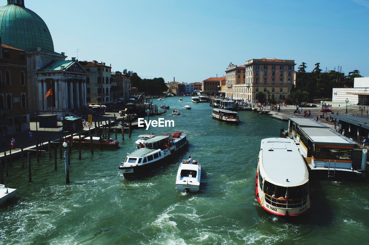 VIEW OF BOATS MOORED IN CANAL