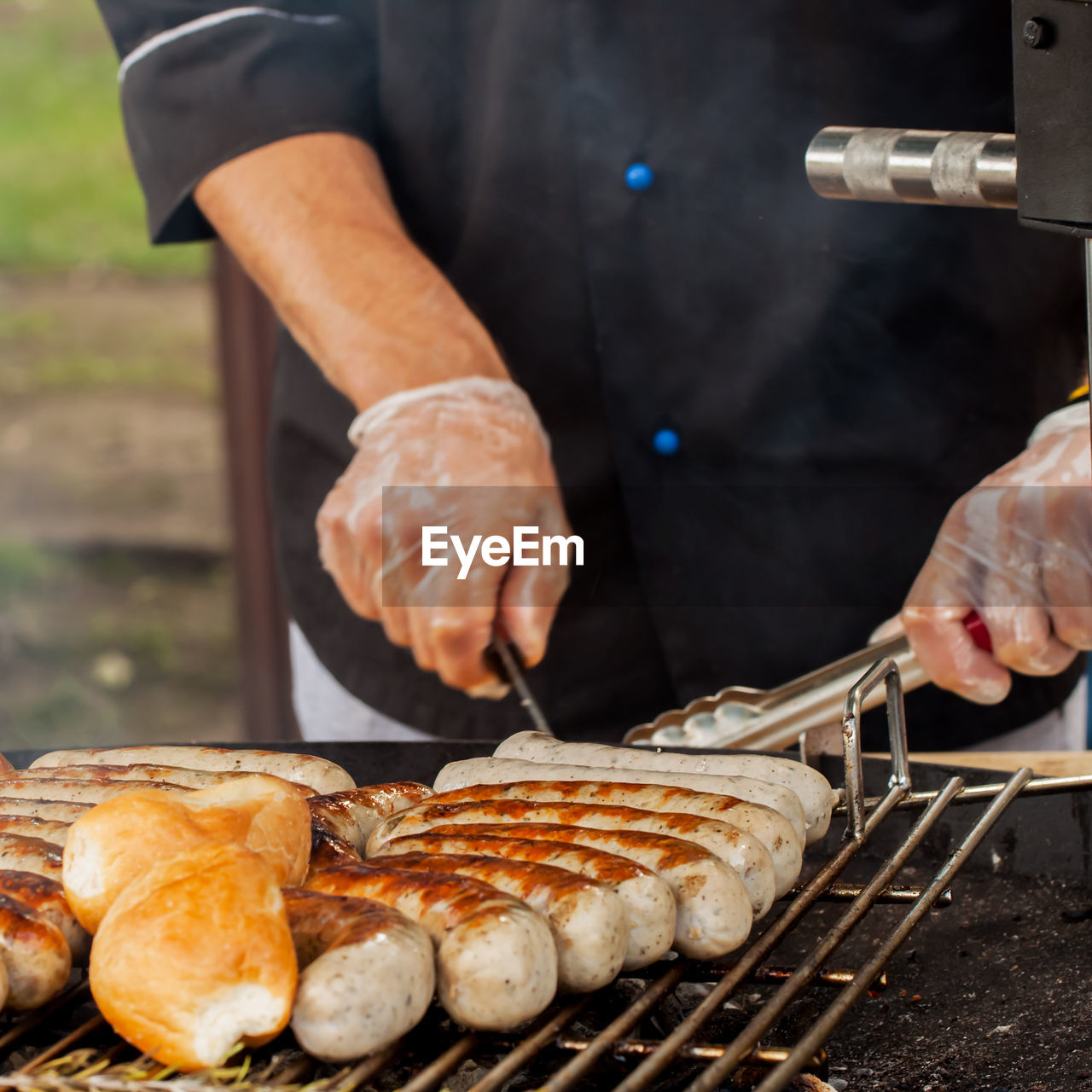 MAN PREPARING FOOD