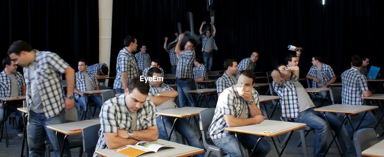 Multiple image of man in classroom