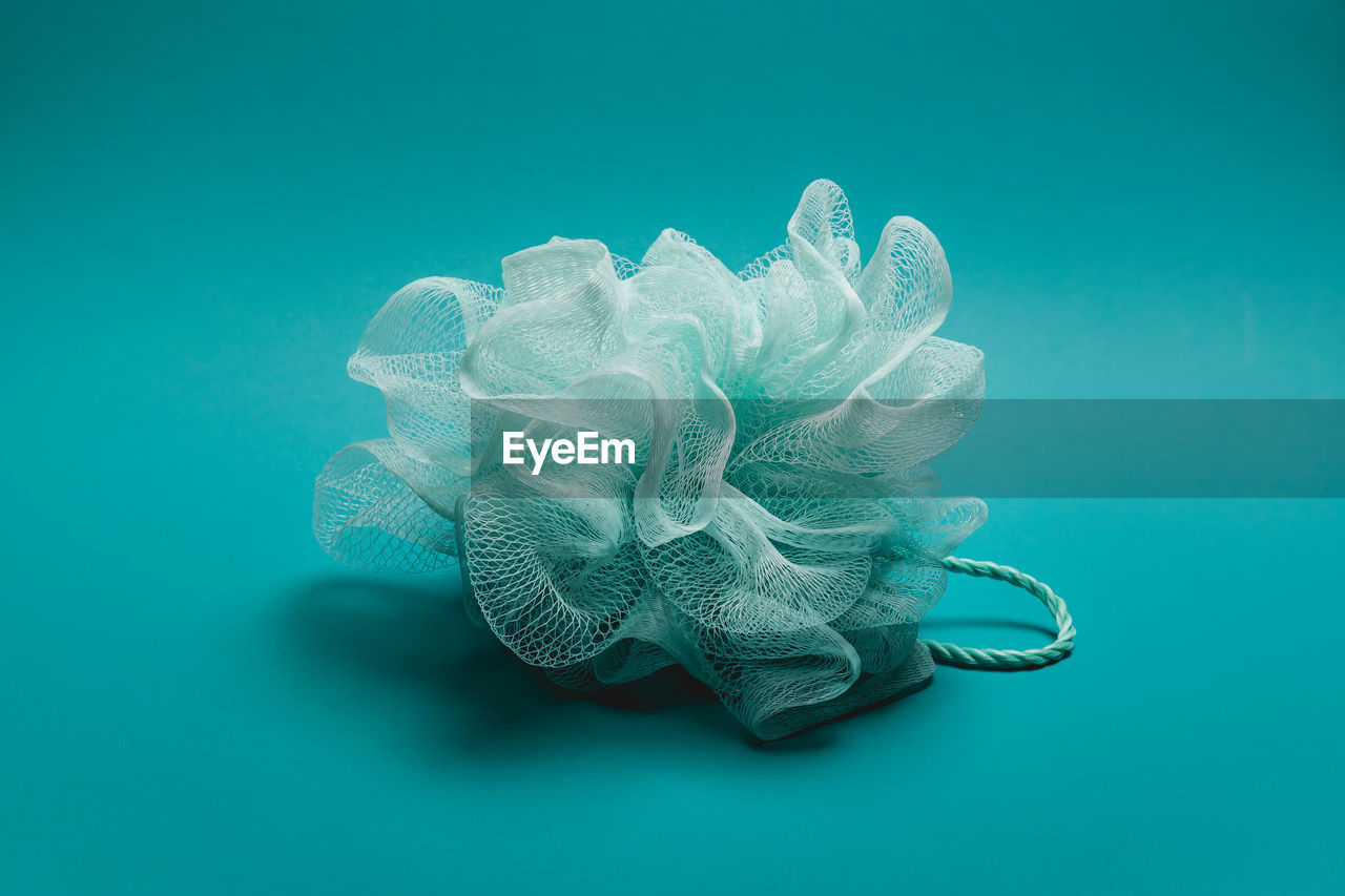 Close-up of rubber band on table