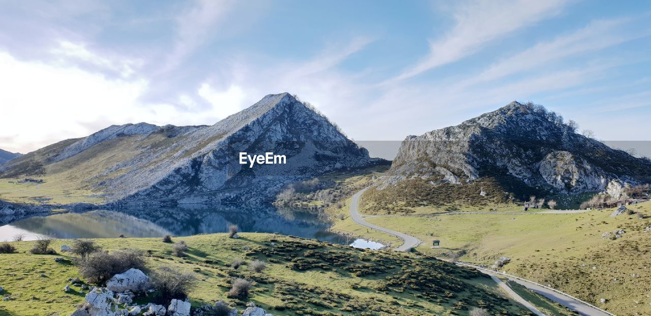 Scenic view of snowcapped mountains against sky