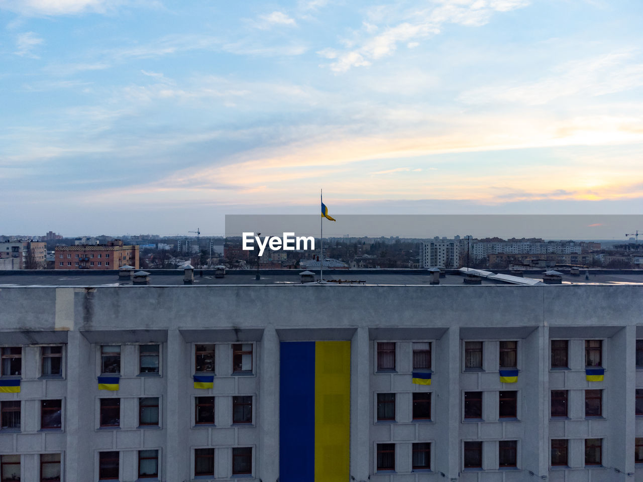 high angle view of buildings in city against sky