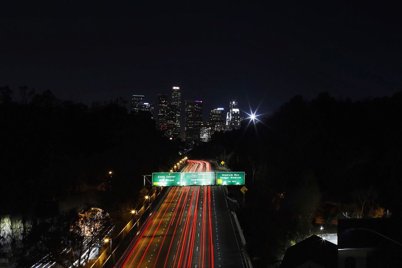 High angle view of illuminated city street at night
