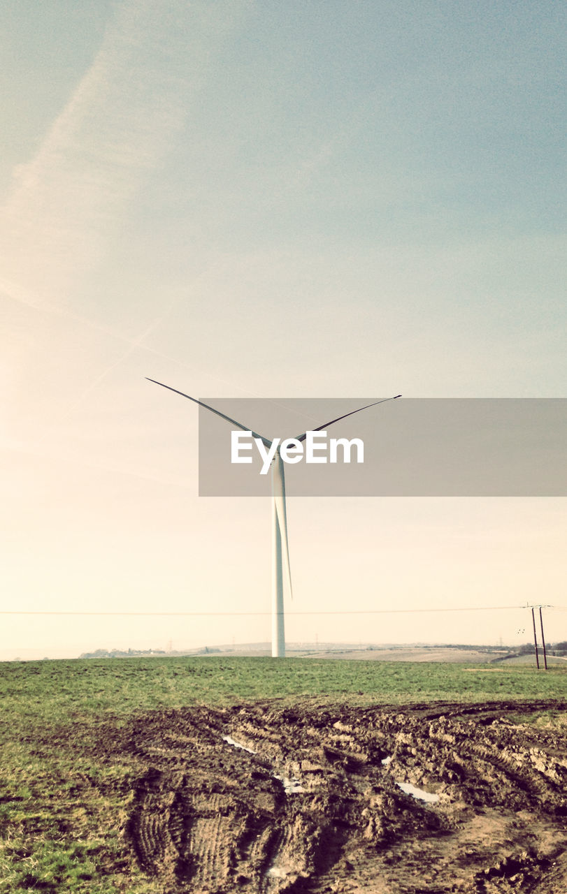 WIND TURBINES ON FIELD