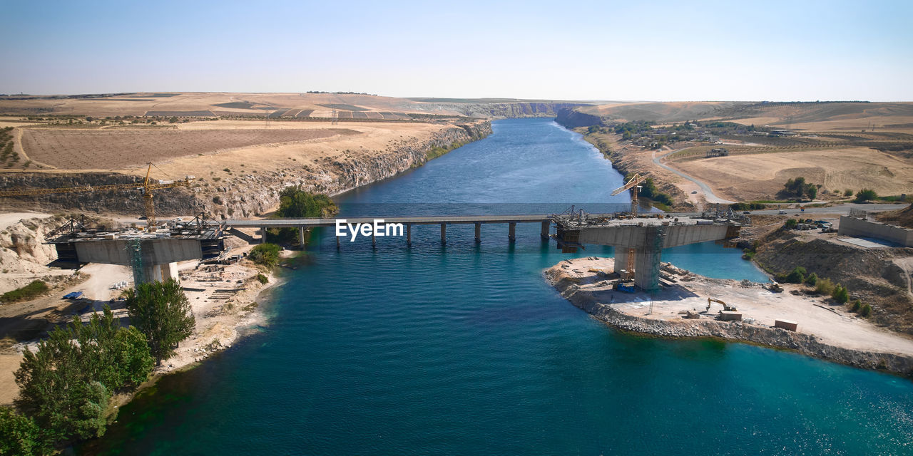 Aerial view of bridge over euphrates river under construction