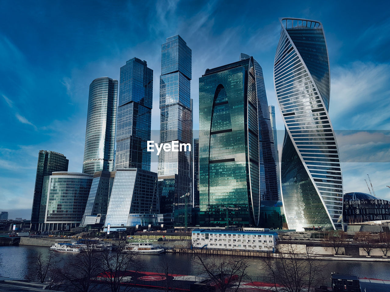 Low angle view of modern buildings against sky