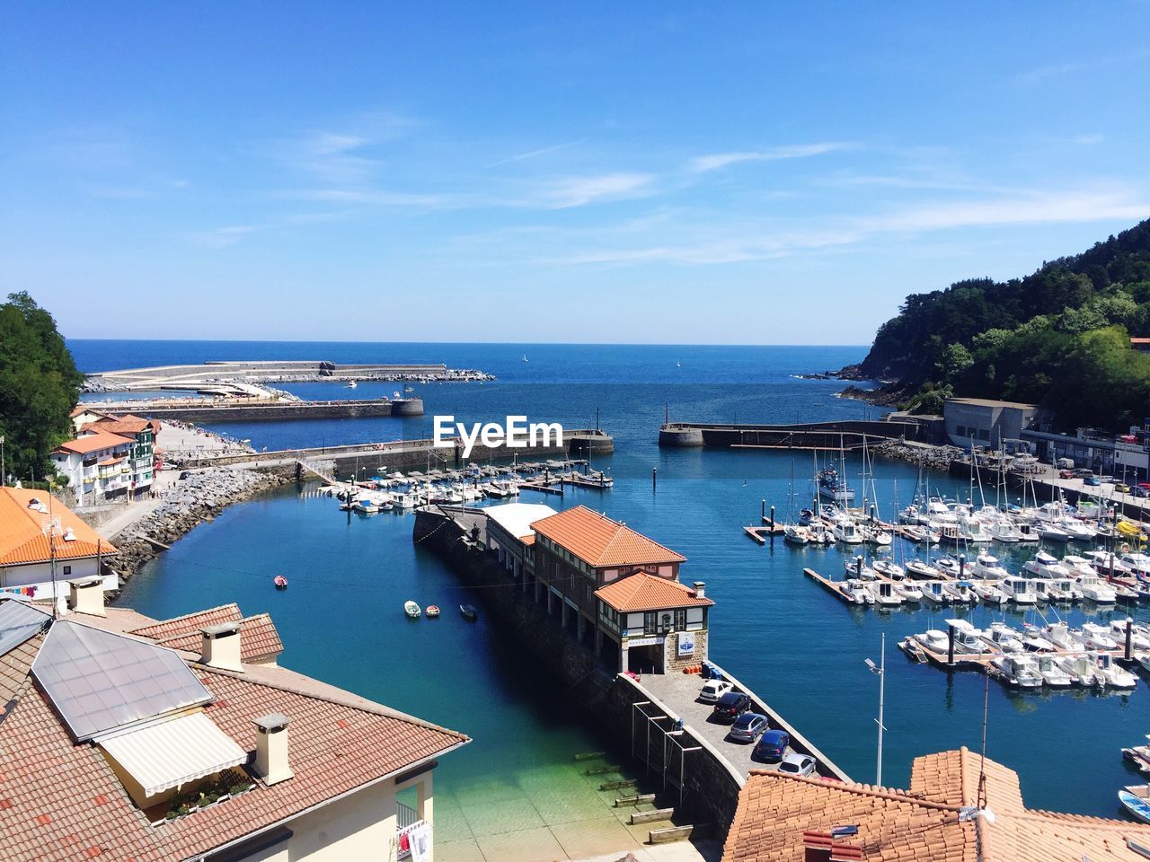 High angle view of sea against blue sky