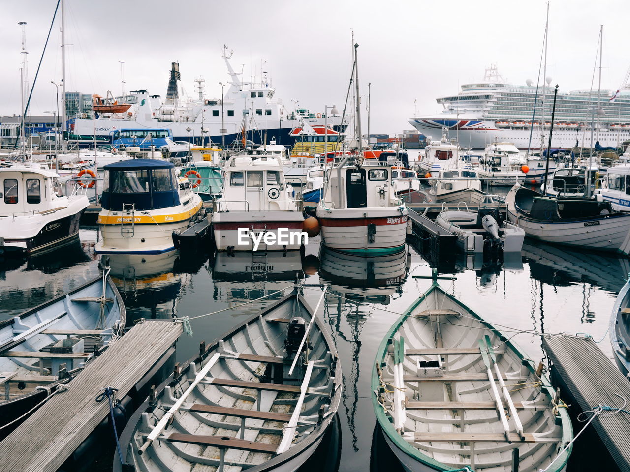 BOATS MOORED IN HARBOR