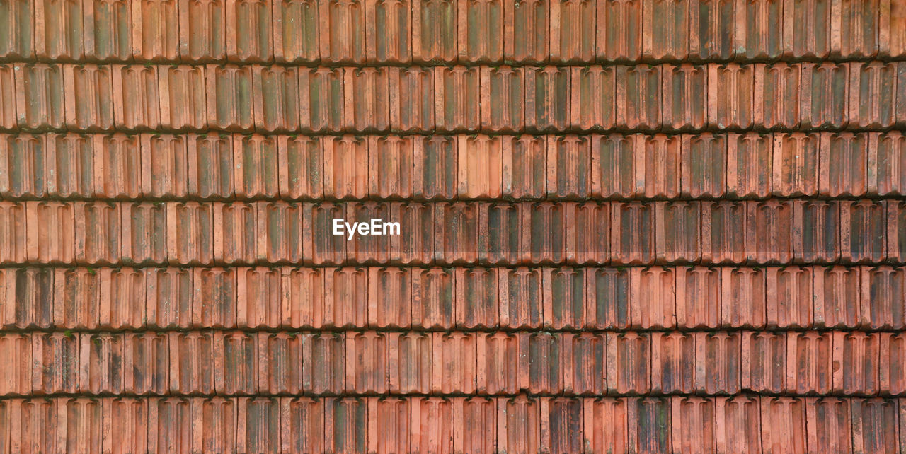 full frame shot of old roof tiles