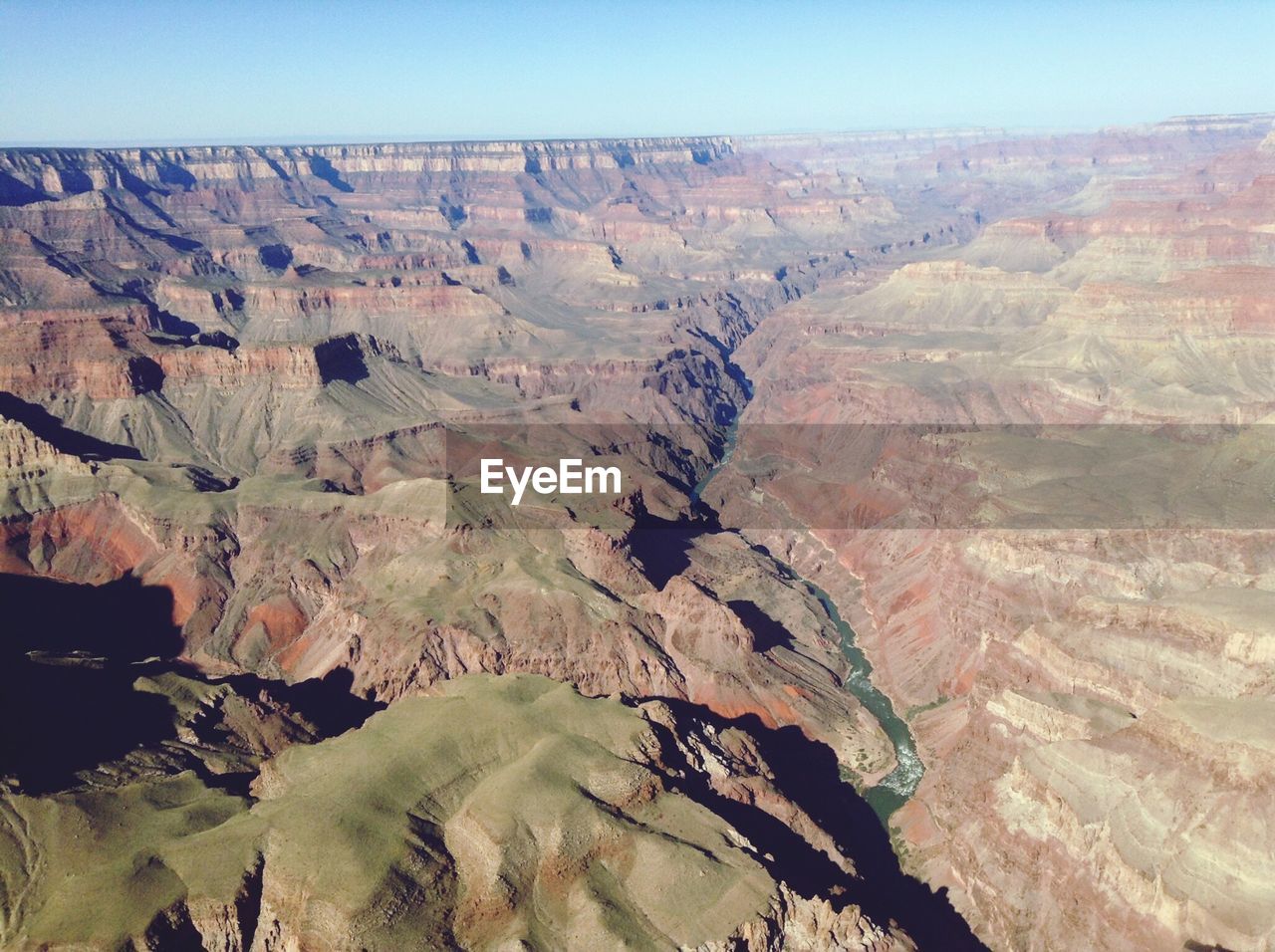 AERIAL VIEW OF LANDSCAPE AND MOUNTAINS AGAINST SKY