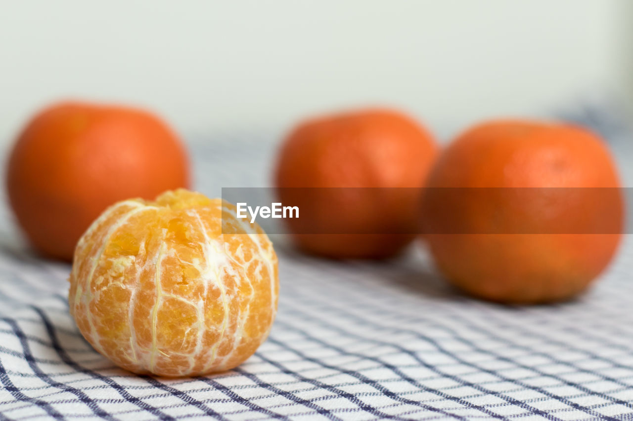 Close-up of orange fruits on table