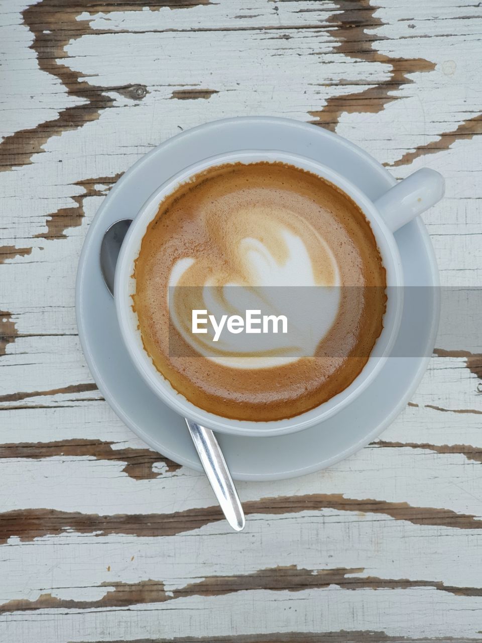 HIGH ANGLE VIEW OF COFFEE ON TABLE