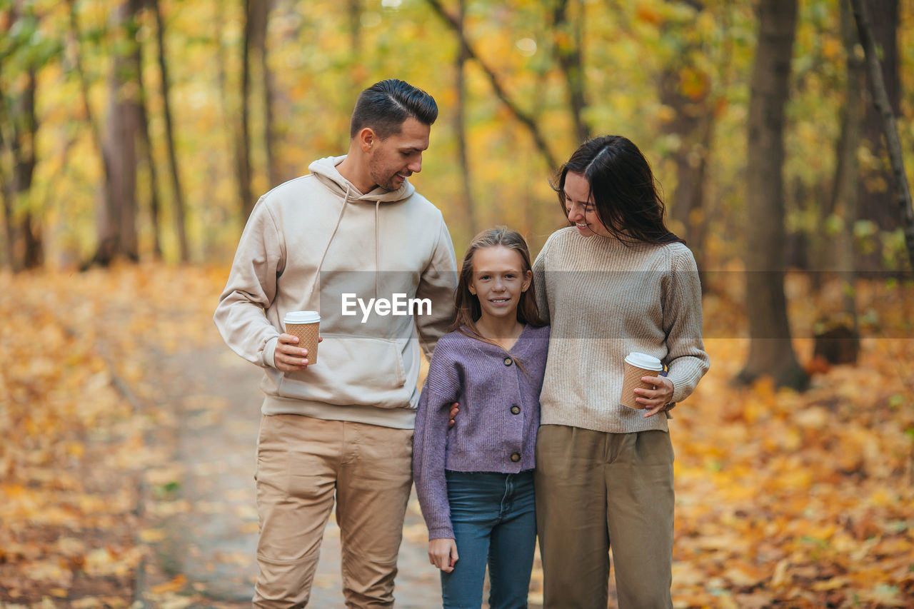 FULL LENGTH OF FATHER AND SON ON TREE