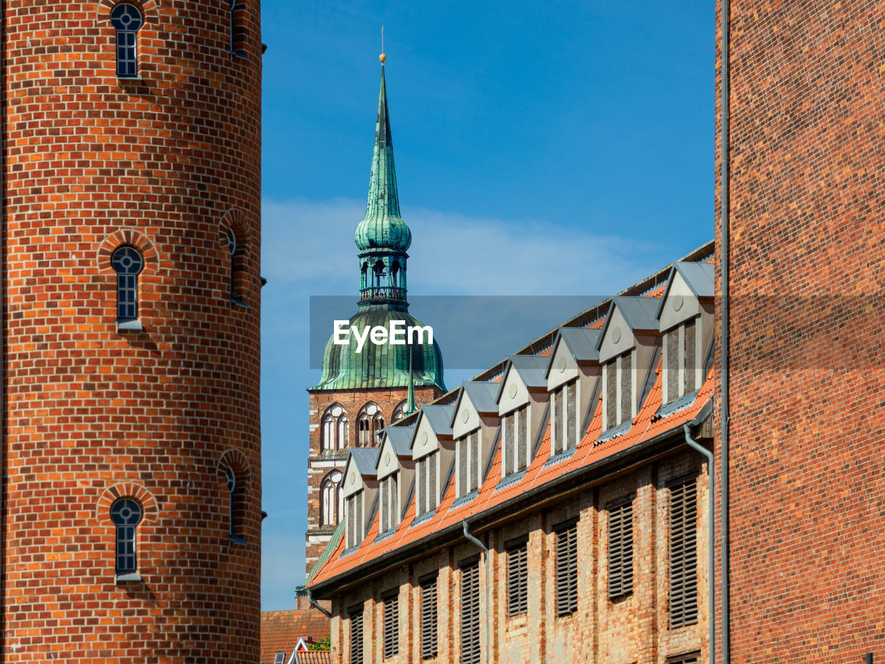 Low angle view of building against blue sky