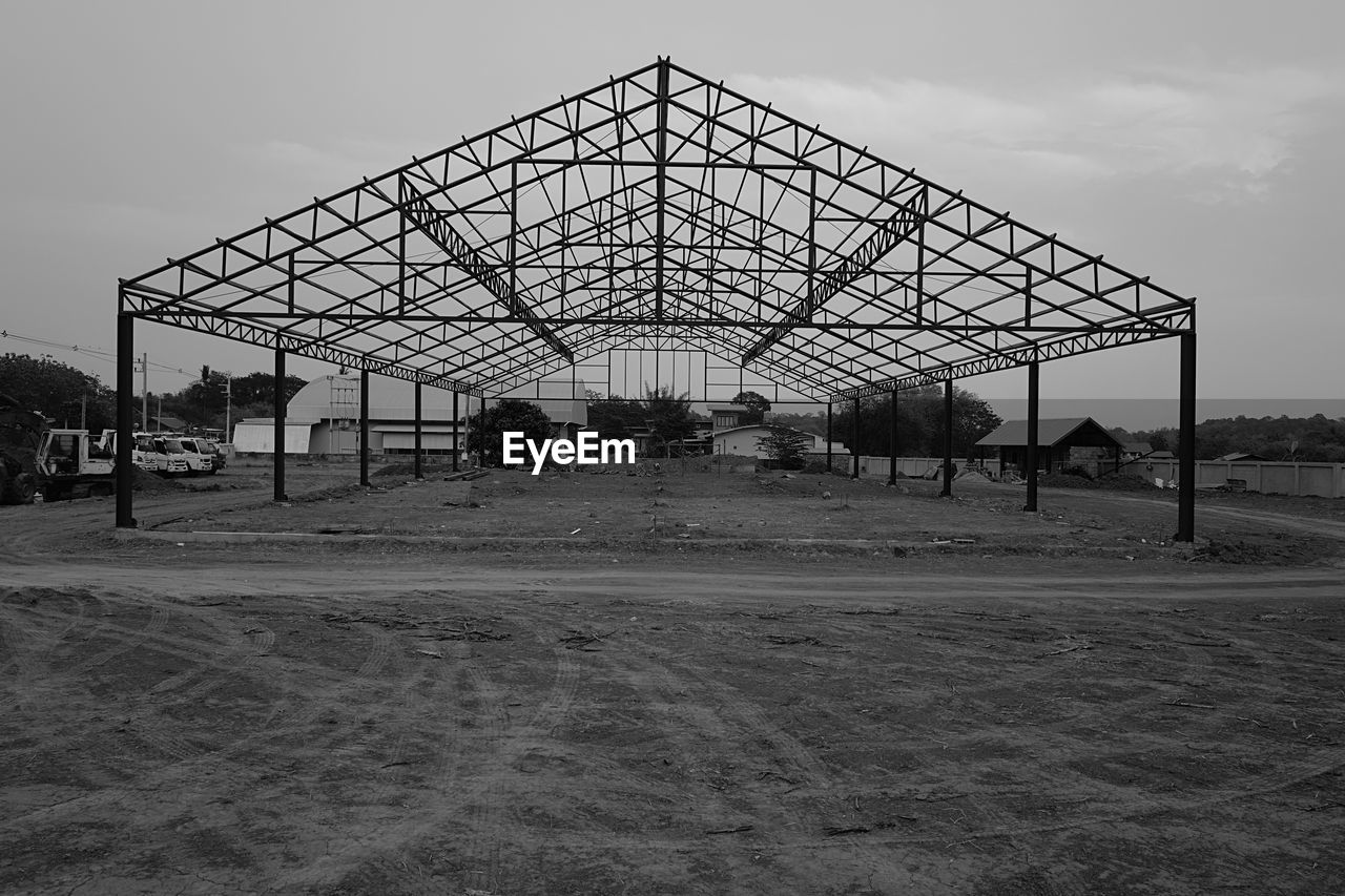 VIEW OF SOCCER FIELD AGAINST BUILDING