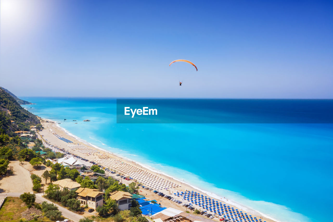 Scenic view of sea against blue sky