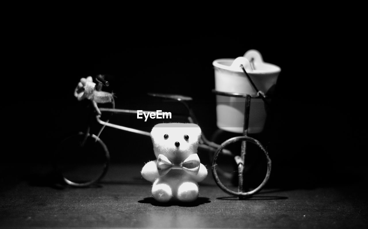 CLOSE-UP OF STUFFED TOY ON TABLE