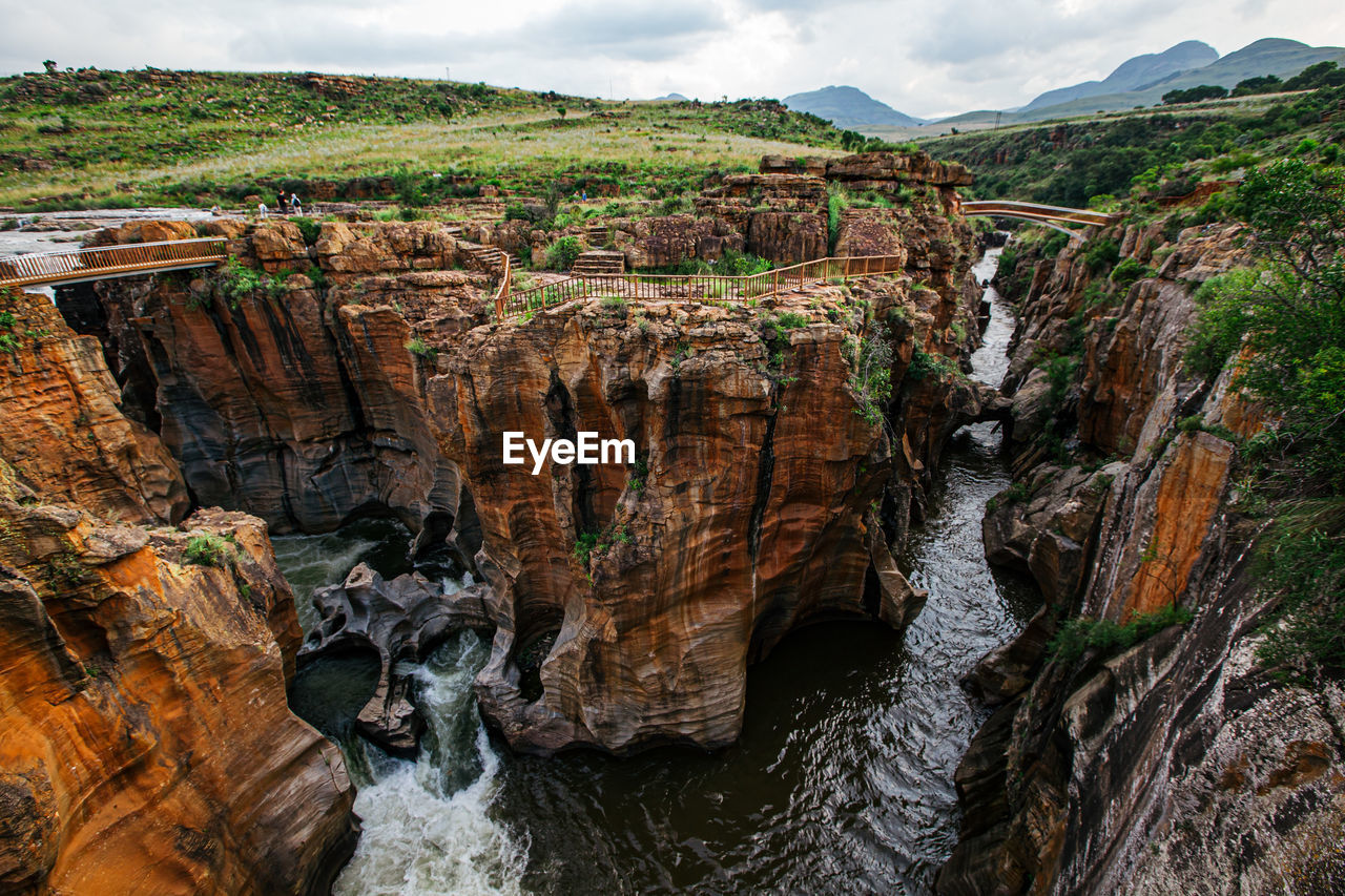 SCENIC VIEW OF ROCKS IN MOUNTAINS