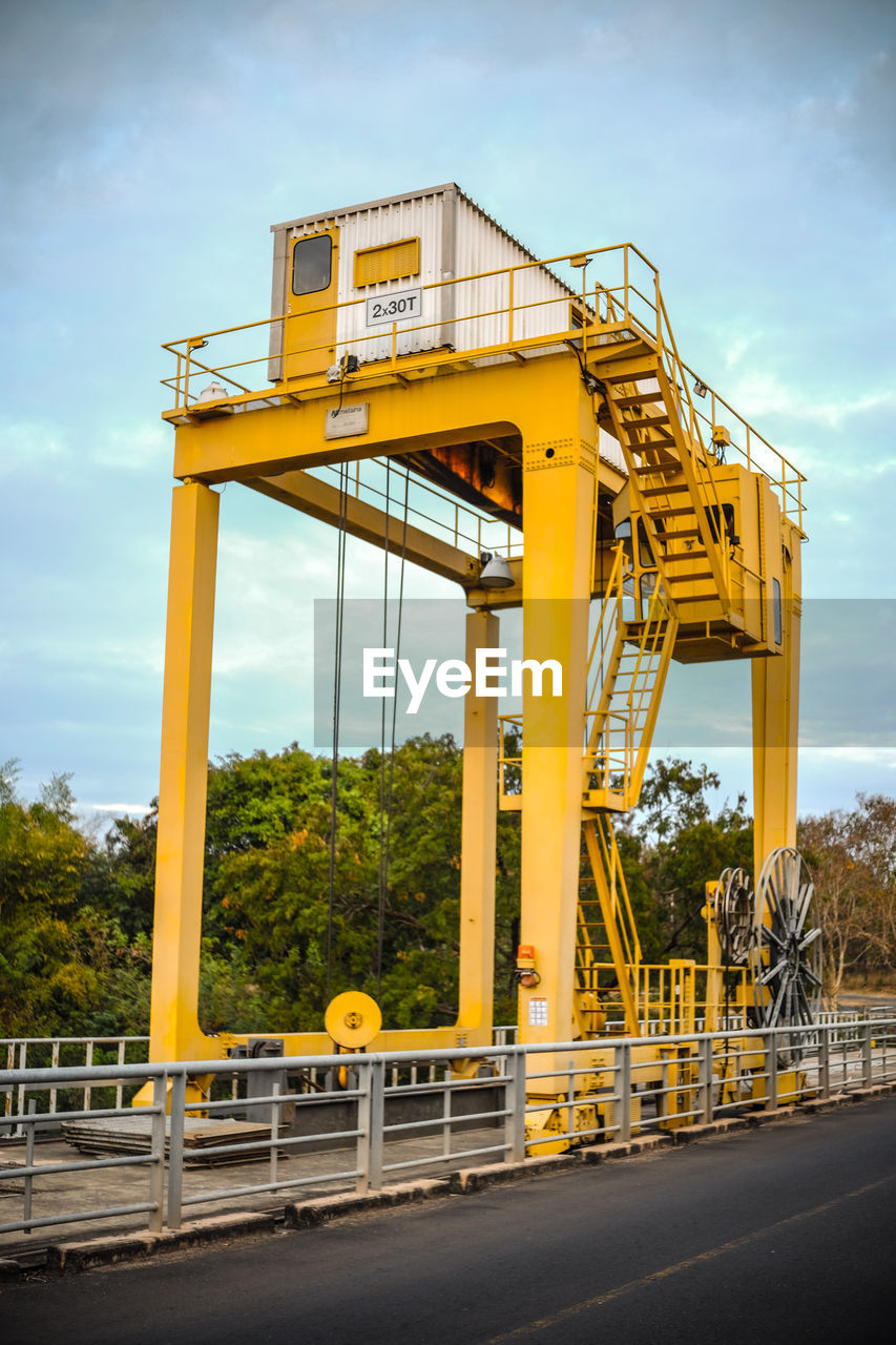 YELLOW BRIDGE AGAINST SKY
