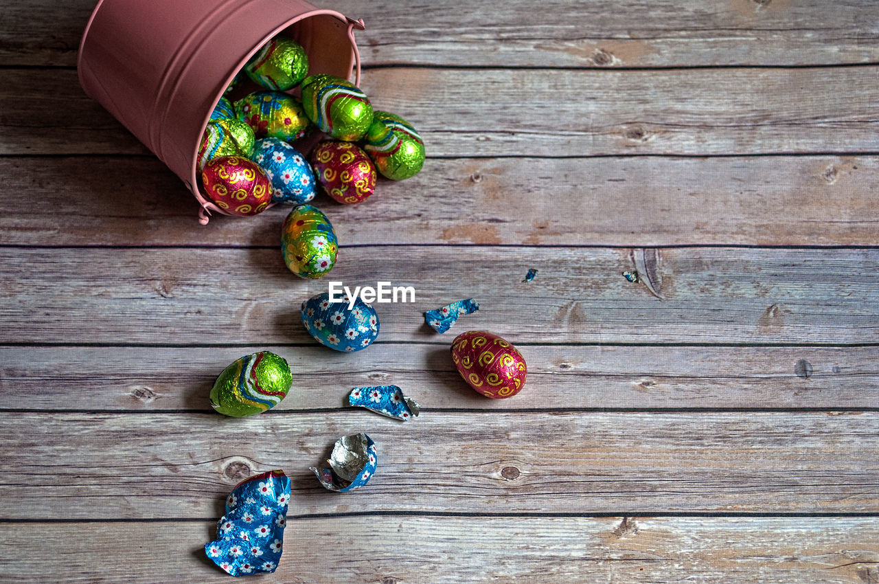 High angle view of easter eggs on wooden table