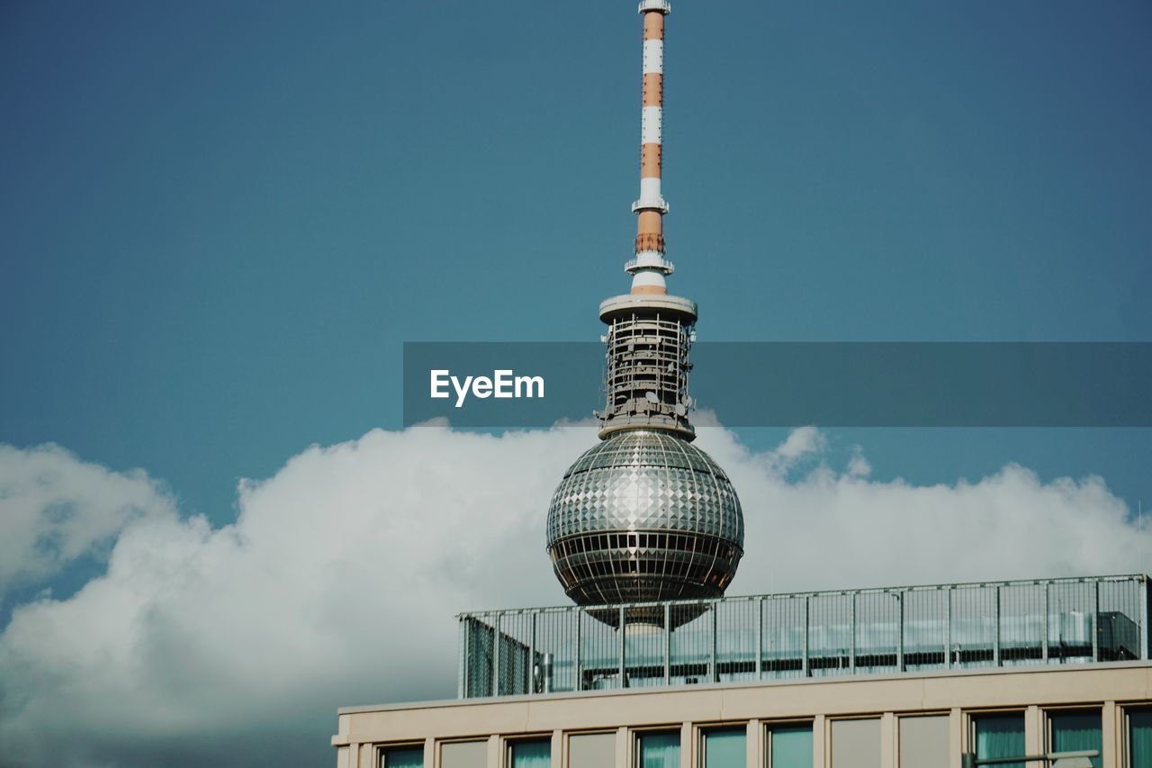 Low angle view of fernsehturm tower against sky