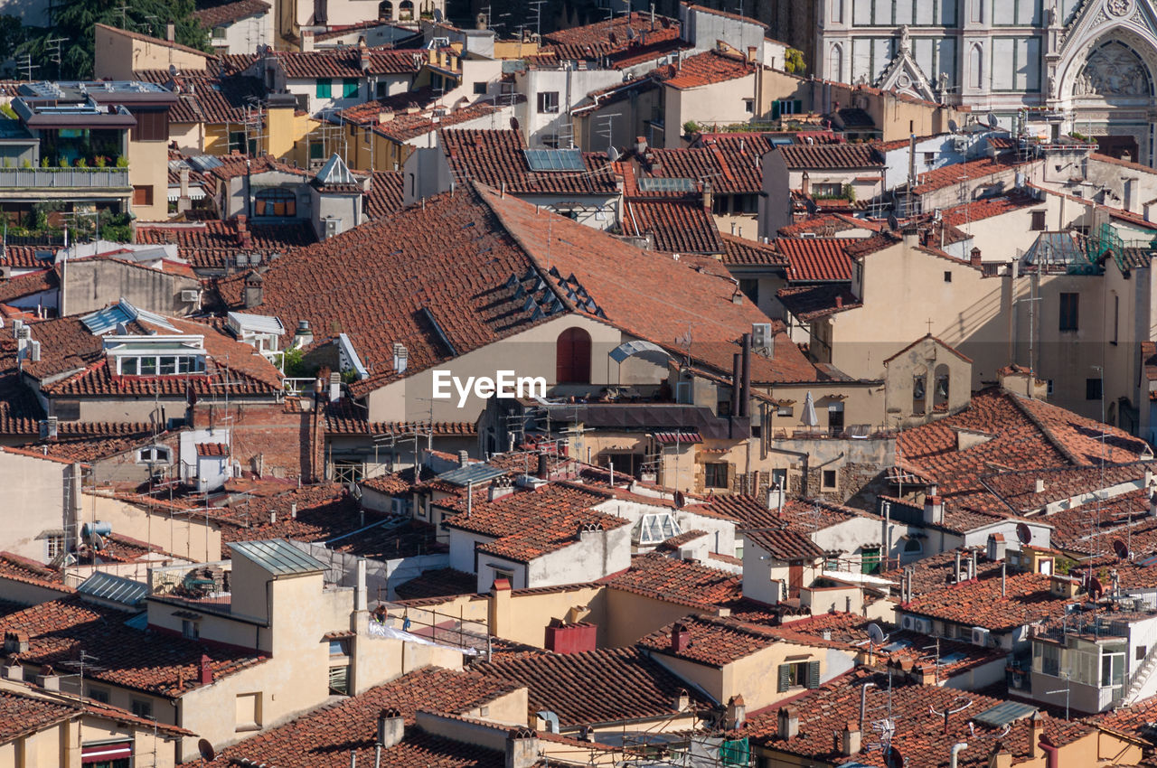 Birds eye view of red-tiled rooftops of florence medieval historic cenrte in italy