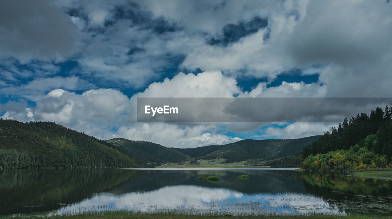 Scenic reflection of mountain range in lake