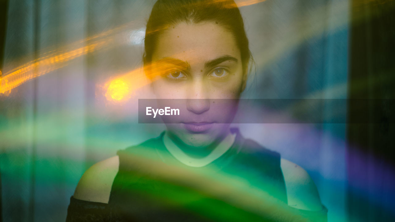 Close-up portrait of woman with spectrum