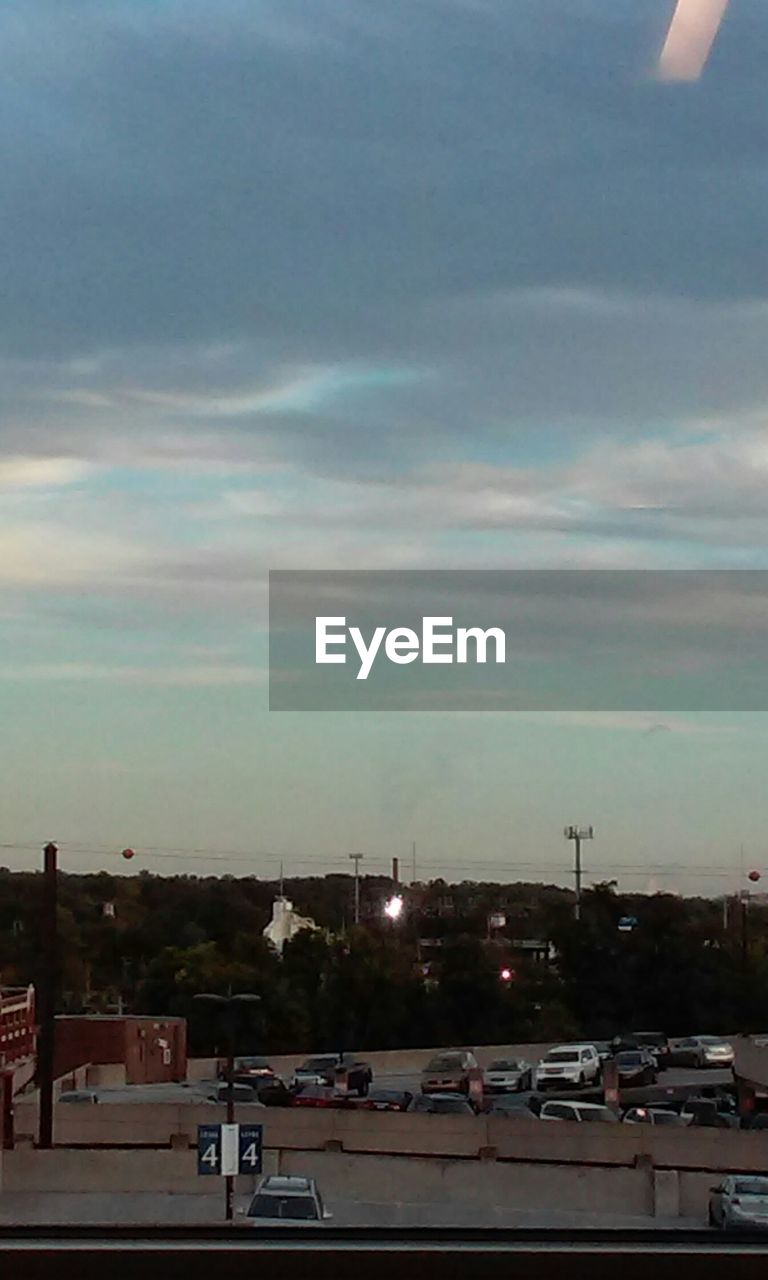 VIEW OF CLOUDY SKY OVER CITY