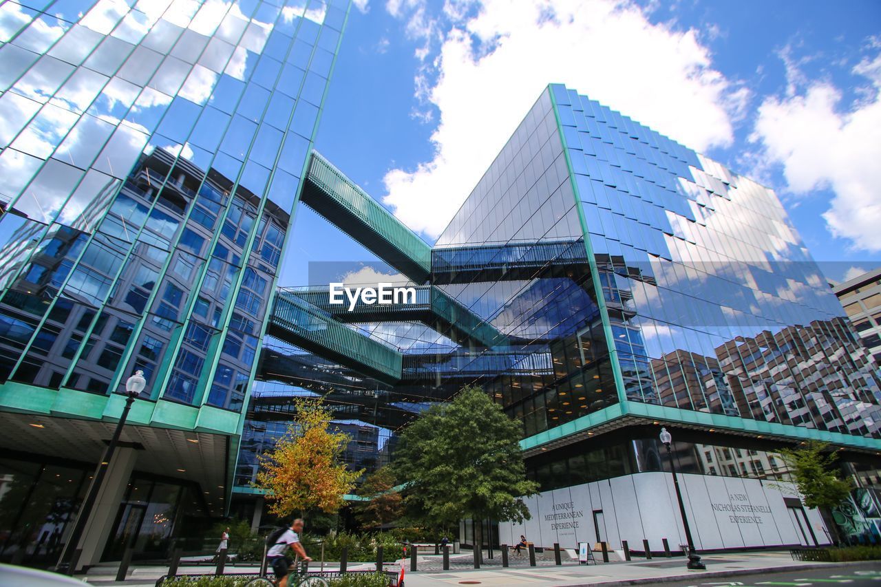 LOW ANGLE VIEW OF MODERN BUILDINGS IN CITY